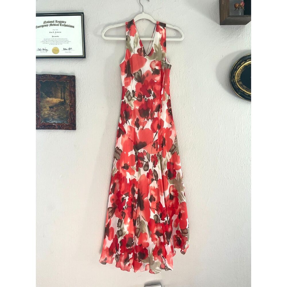 Floor length red floral dress; sleeveless; v neck; v back; zipper closure